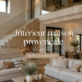 Intérieur d'une maison avec une décoration de style provençal, mettant en avant des couleurs chaudes et des matériaux naturels.